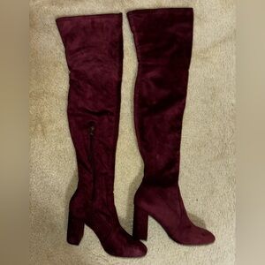 Suede thigh high boot.